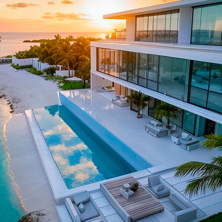 Vista aérea de una mansión imponente en una isla privada en Miami